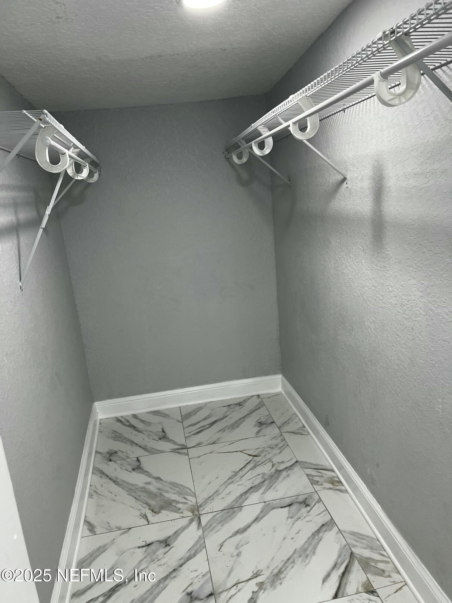 1826 Forest Hills Road Jacksonville, FL 32208 - Photo 10 of 14 a view of a room with racks on the wall