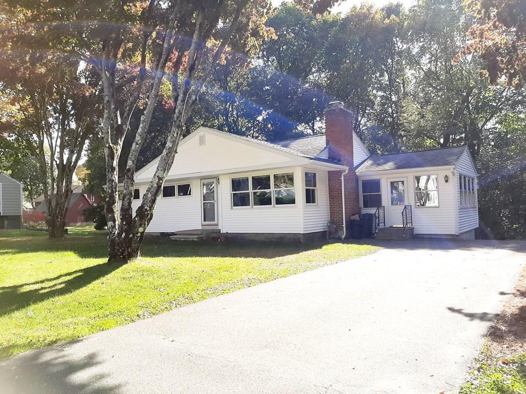 83 Berwick Road Longmeadow, MA 01106 - Photo 3 of 10 a front view of a house with a yard