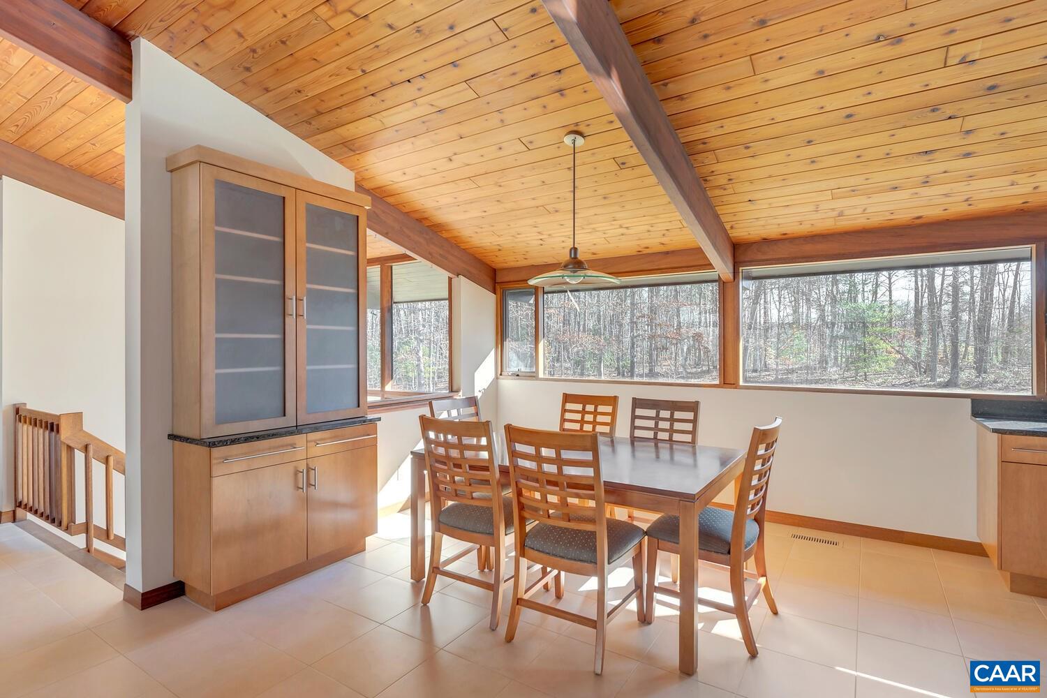 2706 Paddock Wood Road Keswick, VA 22947 - Photo 21 of 42 a view of a dining room with furniture window and outside view
