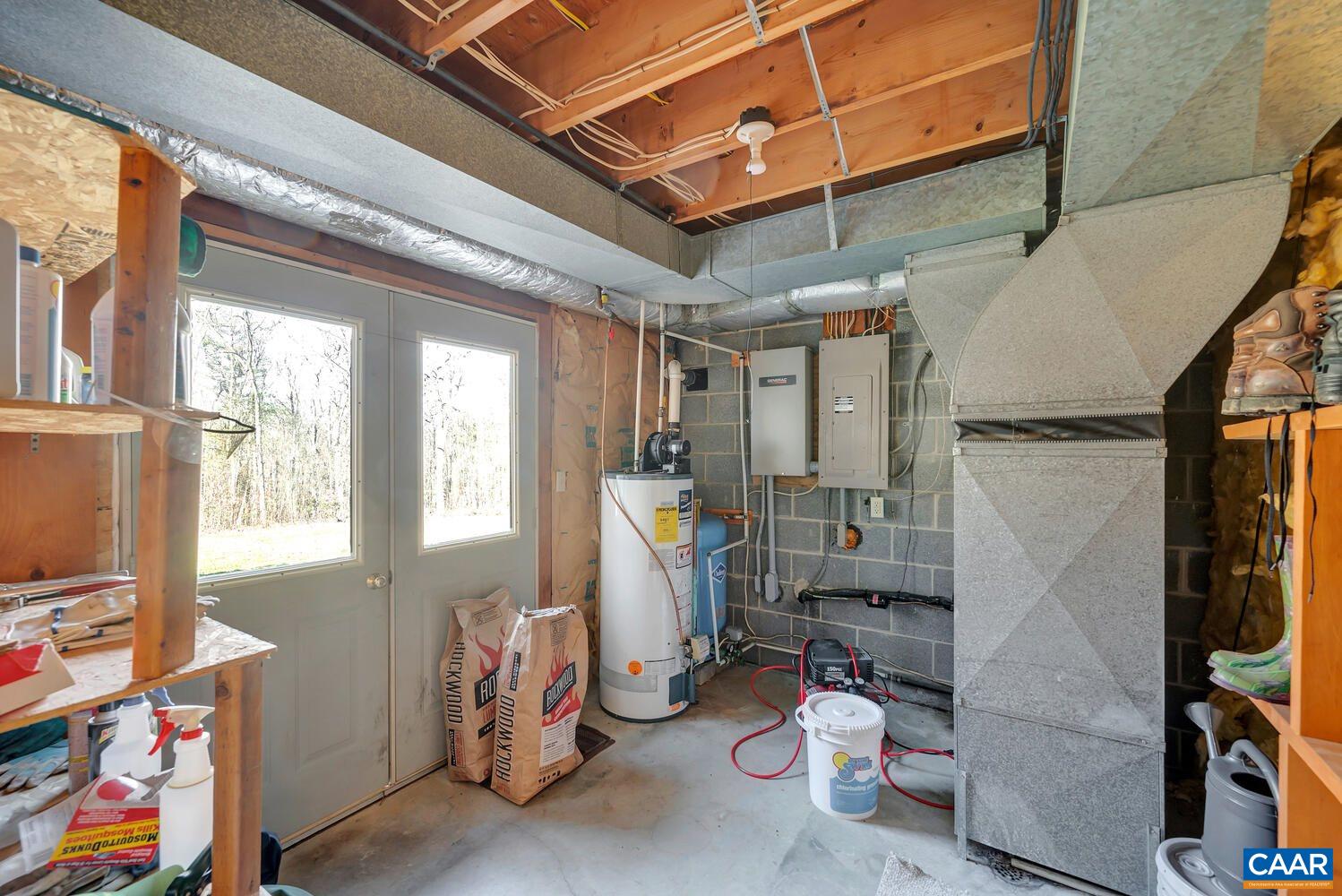 2706 Paddock Wood Road Keswick, VA 22947 - Photo 36 of 42 a room with furniture and a window