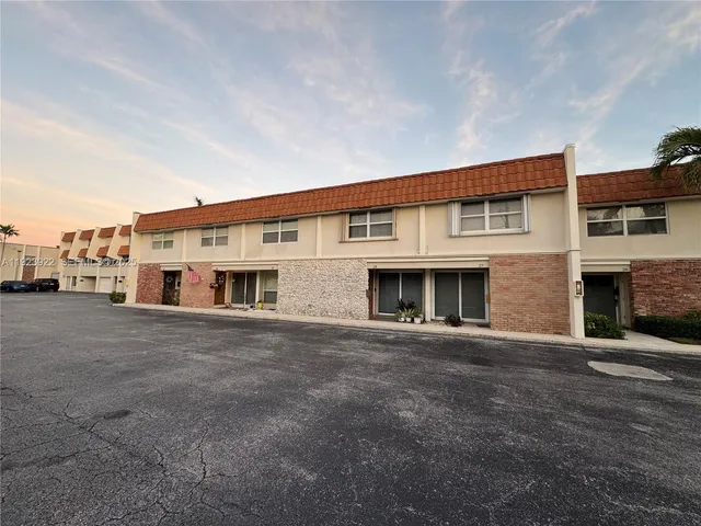 a large house with a street view