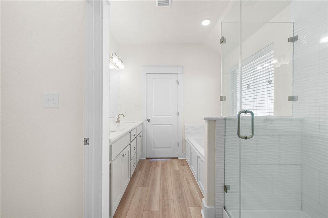 172 Pleasant Path Somerville, TX 77879 - Photo 4 of 13 a bathroom with a sink