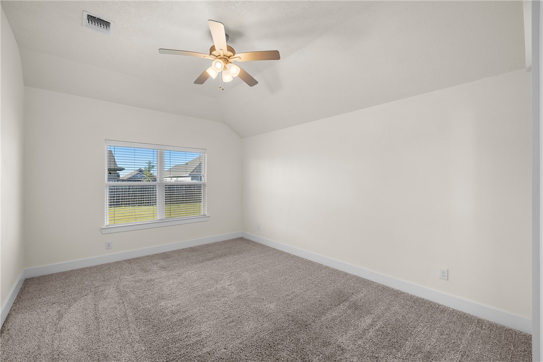 172 Pleasant Path Somerville, TX 77879 - Photo 8 of 13 an empty room with a window