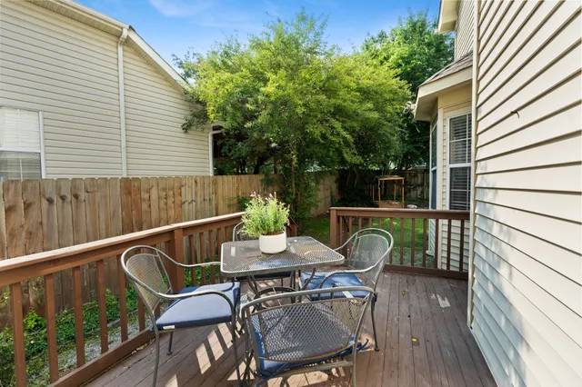 a deck view with a seating space