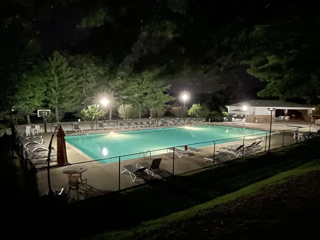 a view of a lake with a yard