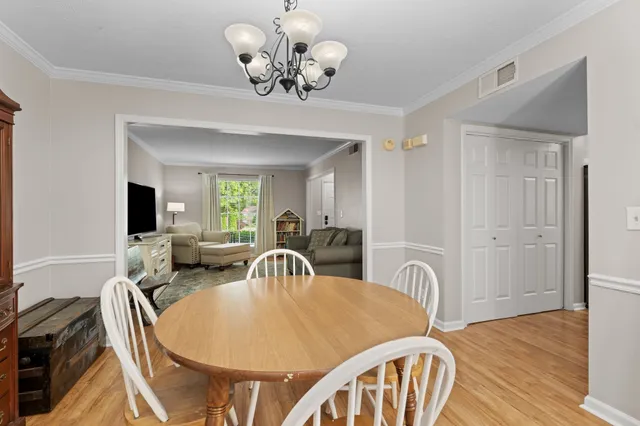 a view of a dining room with furniture