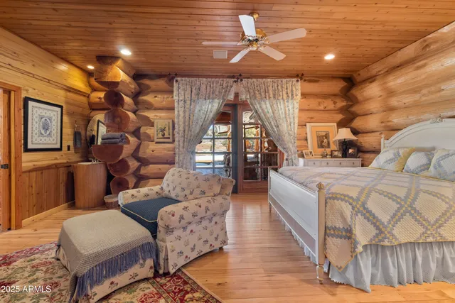 a kitchen with kitchen island granite countertop a sink stove and cabinets