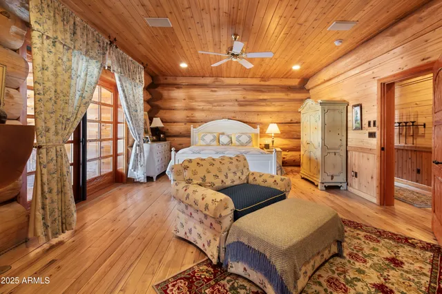 a living room with a lots of gym equipment