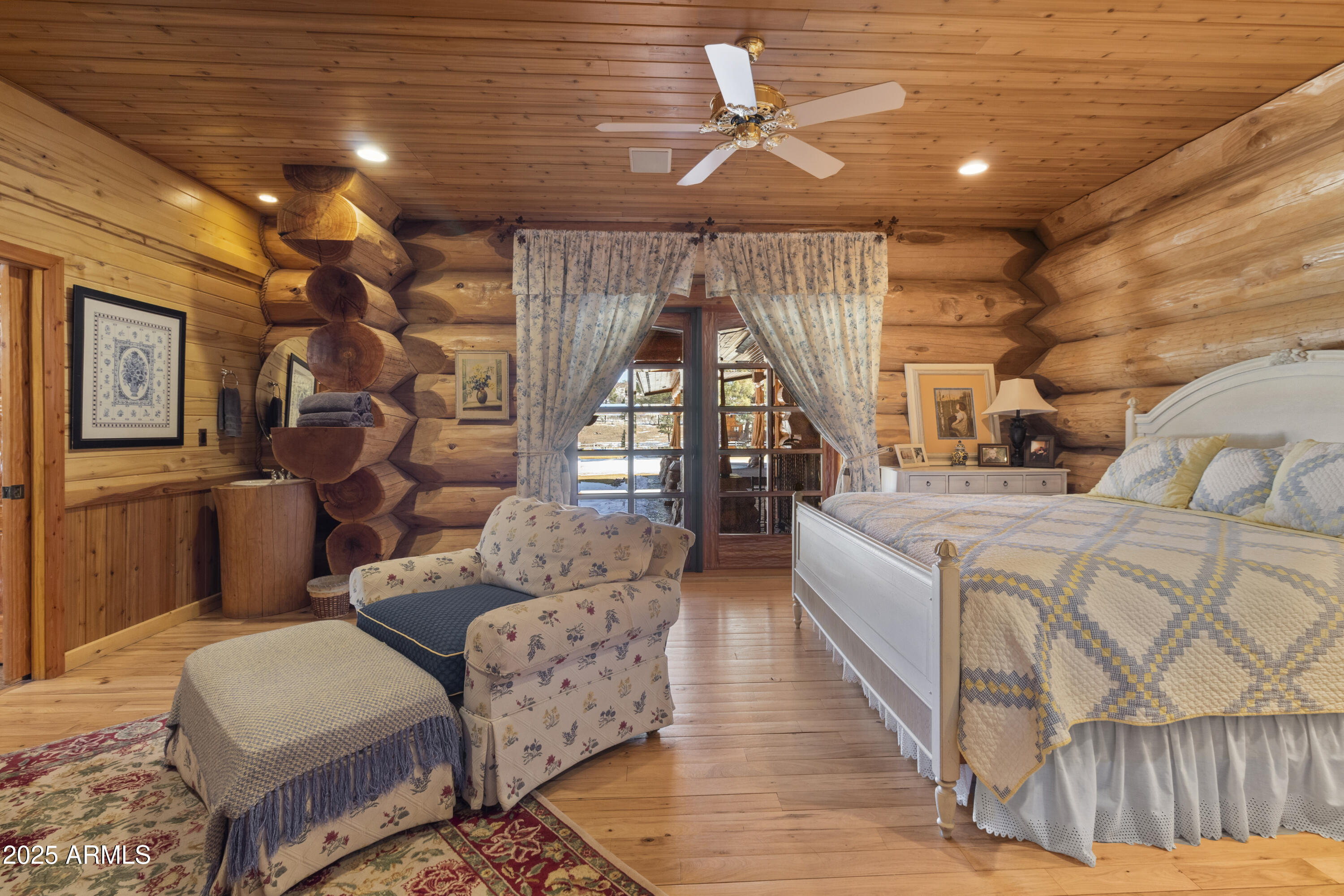 1613 Black Canyon Road Heber, AZ 85928 - Photo 18 of 99 a bedroom with furniture and wooden floor