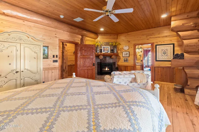 a view of a dining room with furniture wooden floor and chandelier