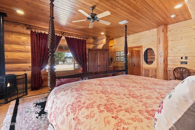 a bathroom with a double vanity sink and mirror