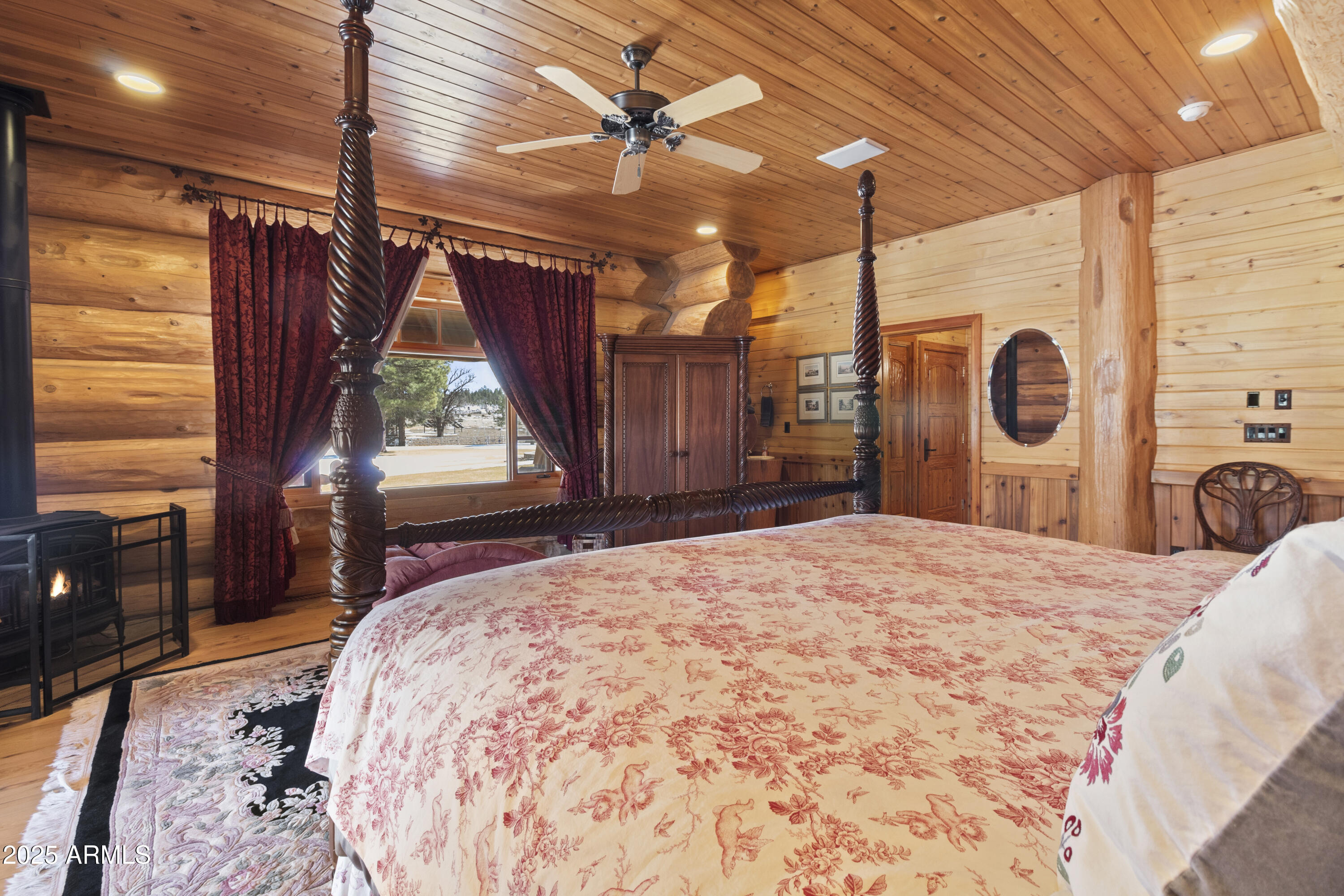 1613 Black Canyon Road Heber, AZ 85928 - Photo 24 of 98 a bed sitting in a spacious bedroom next to a window