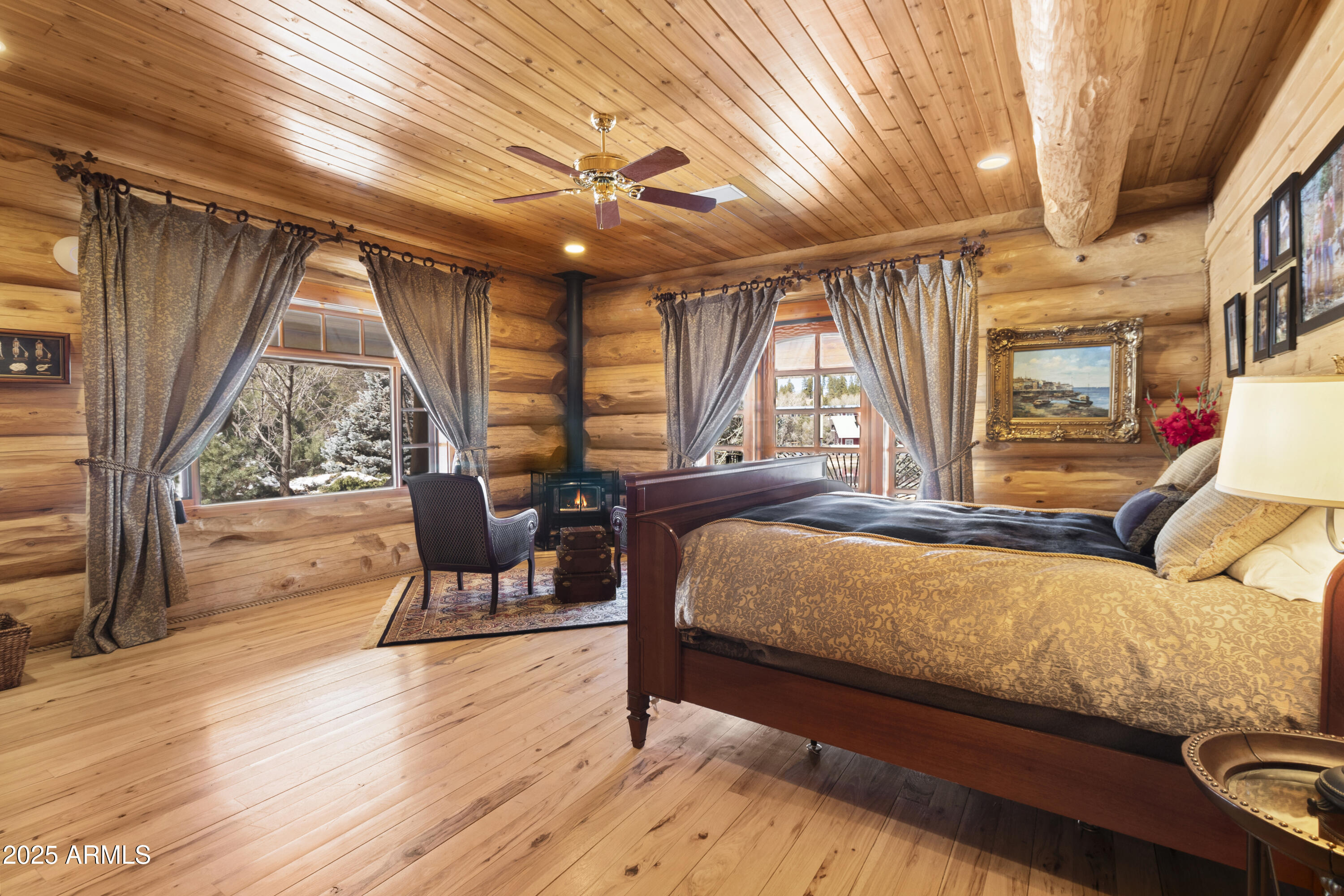 1613 Black Canyon Road Heber, AZ 85928 - Photo 25 of 98 a bedroom with a bed and a large window