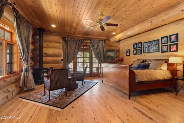 a living room with a couch and a chandelier