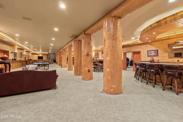 a view of a lake with chairs