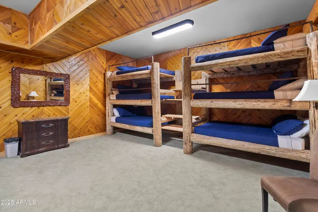 a front view of residential houses with swimming pool and porch