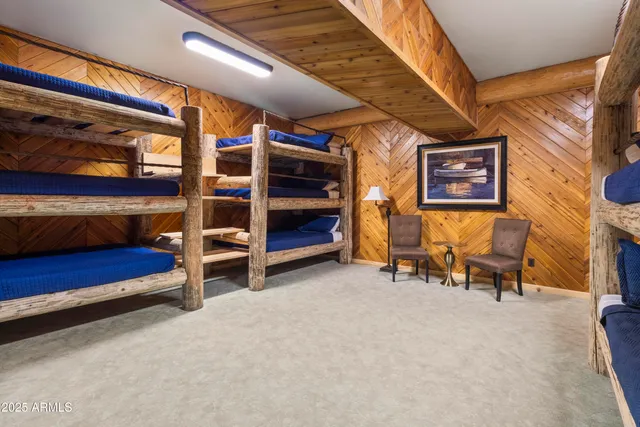 a swimming pool with outdoor seating and yard