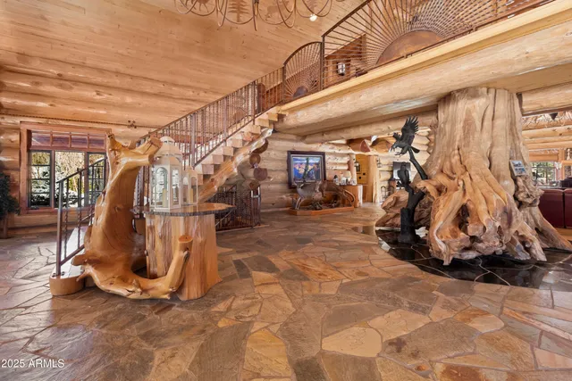 a view of a chairs and table in a patio