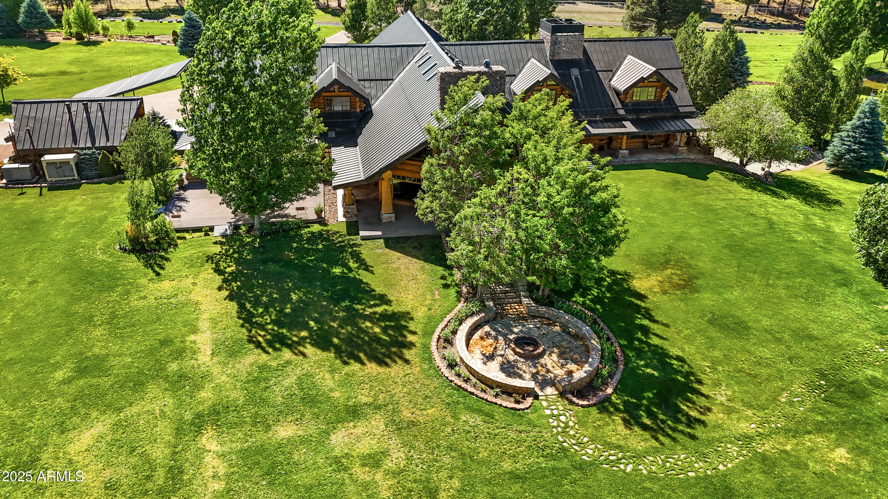 1613 Black Canyon Road Heber, AZ 85928 - Photo 86 of 99 an aerial view of a house with a yard and trees all around