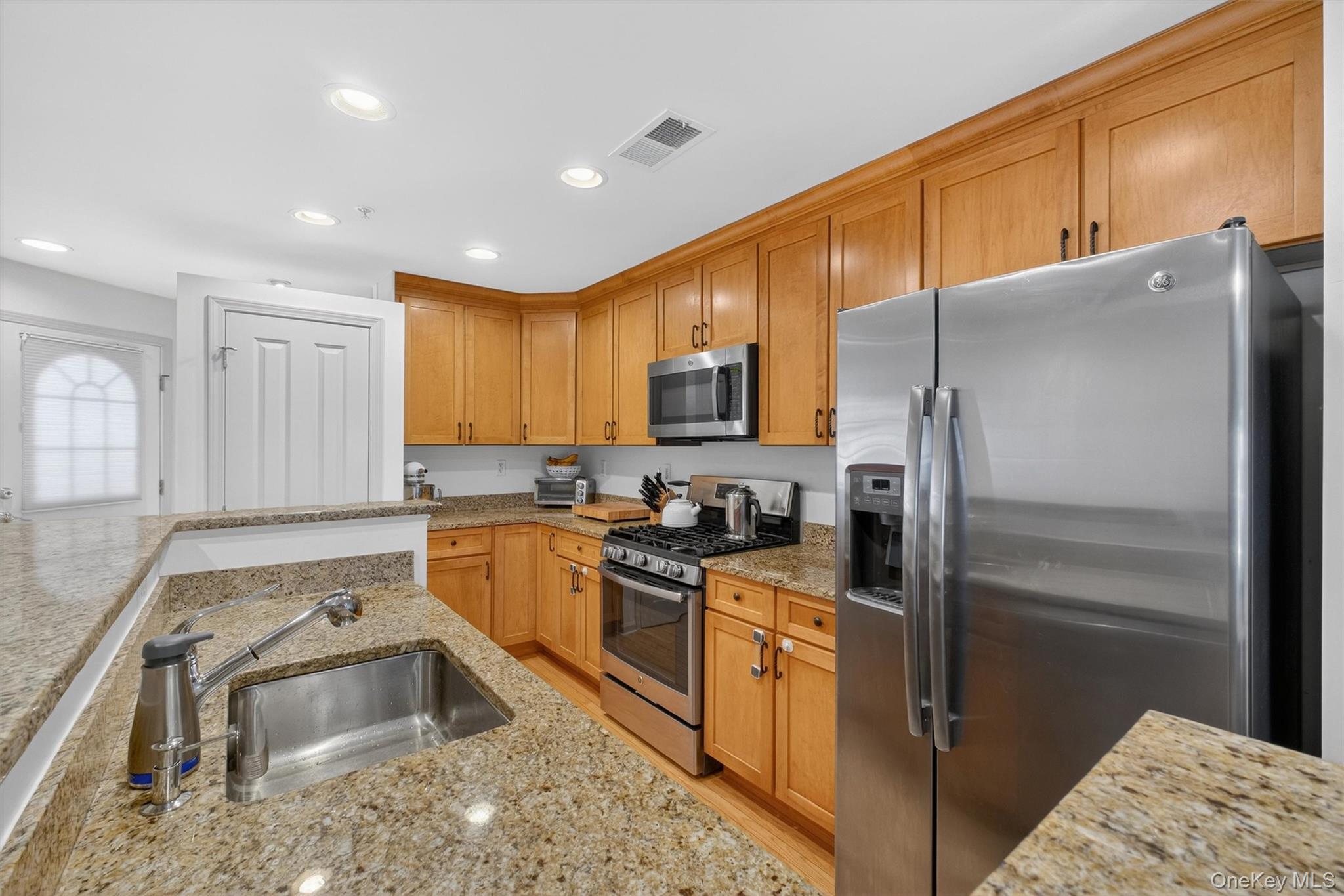 213 Riverbend Drive Peekskill, NY 10566 - Photo 12 of 46 Stainless steel appliances and a convenient Pantry for extra storage.