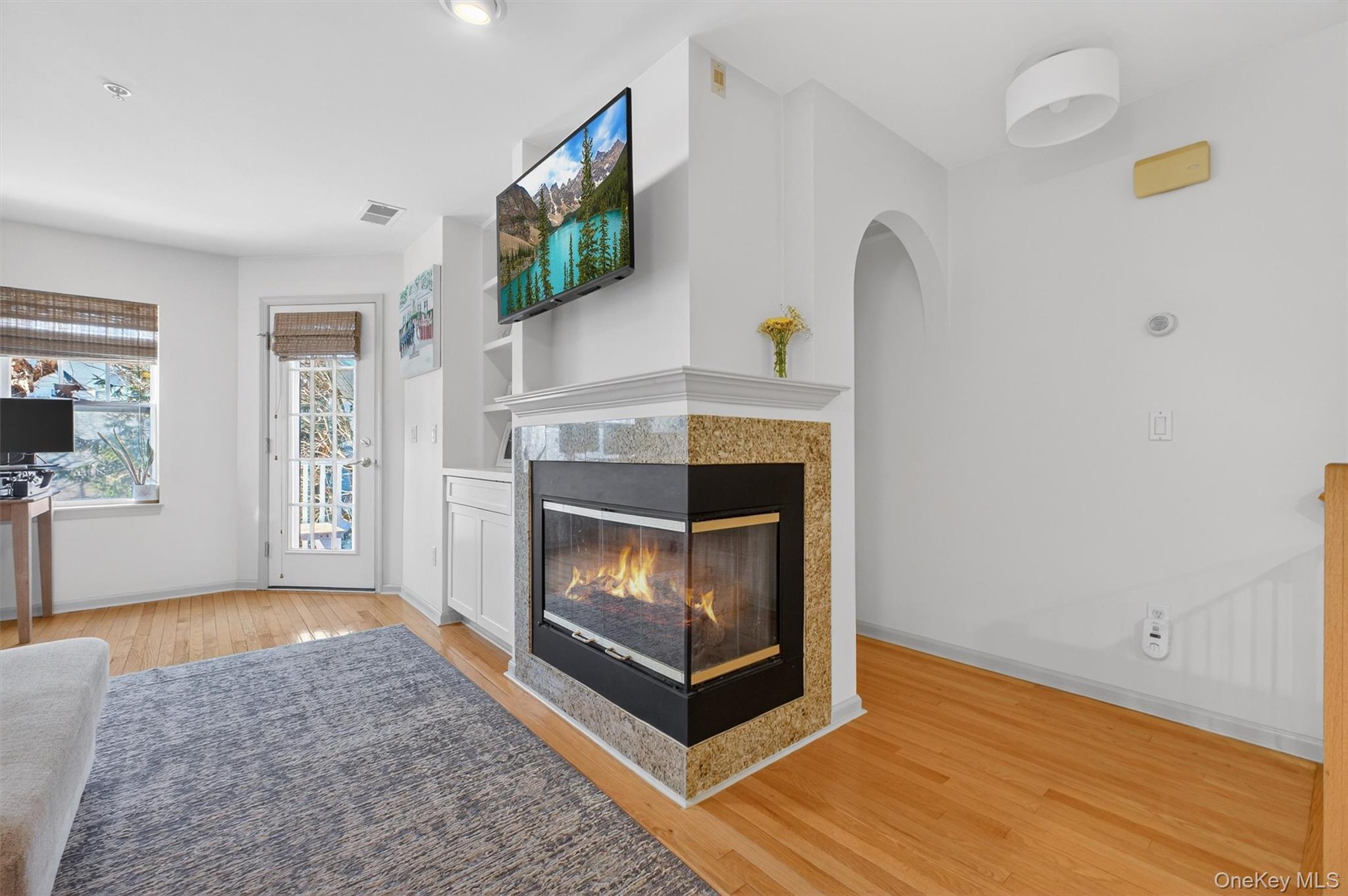 213 Riverbend Drive Peekskill, NY 10566 - Photo 6 of 46 Arched doorway to the coat closet provides an elegant and architectural element to the home.