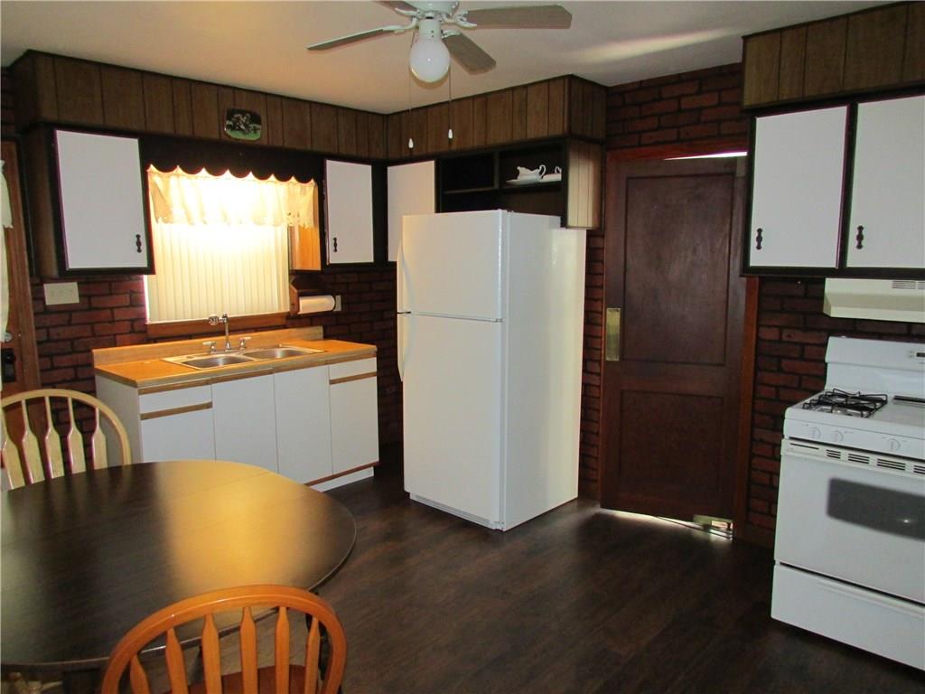 223 Simpson Howell Road Elizabeth, PA 15037 - Photo 13 of 25 Eat-in kitchen includes gas stove and refrigerator