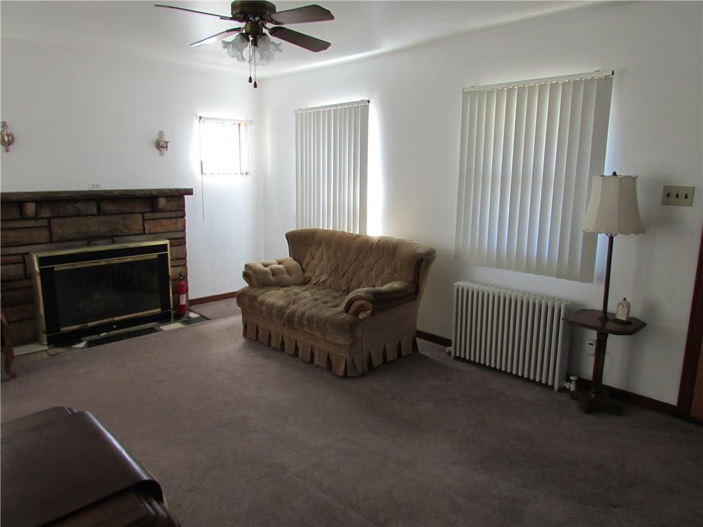 223 Simpson Howell Road Elizabeth, PA 15037 - Photo 9 of 25 Stone fireplace in living room