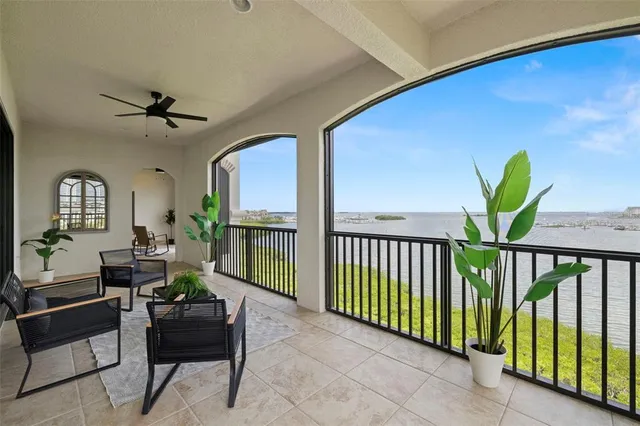 a kitchen with stainless steel appliances granite countertop a stove refrigerator and cabinets