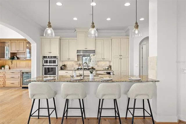 a view of a livingroom with furniture window and wooden floor