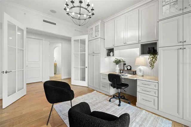 a bathroom with a sink vanity and a mirror