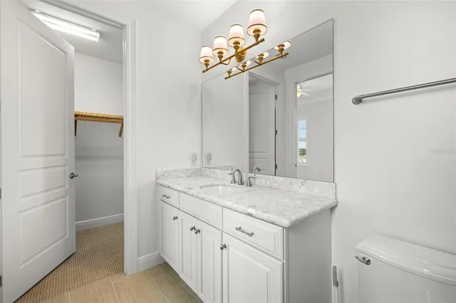 an aerial view of a house with a lake view