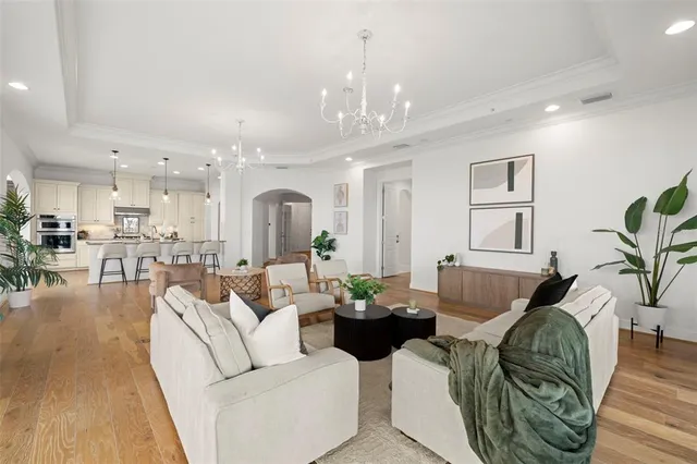 a view of a chairs and table in patio