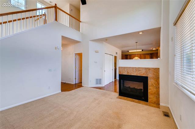 9231 Ballybunion Road Peyton, CO 80831 - Photo 4 of 26 Main level living room.