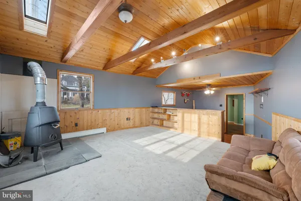 a view of a livingroom with furniture and a couch
