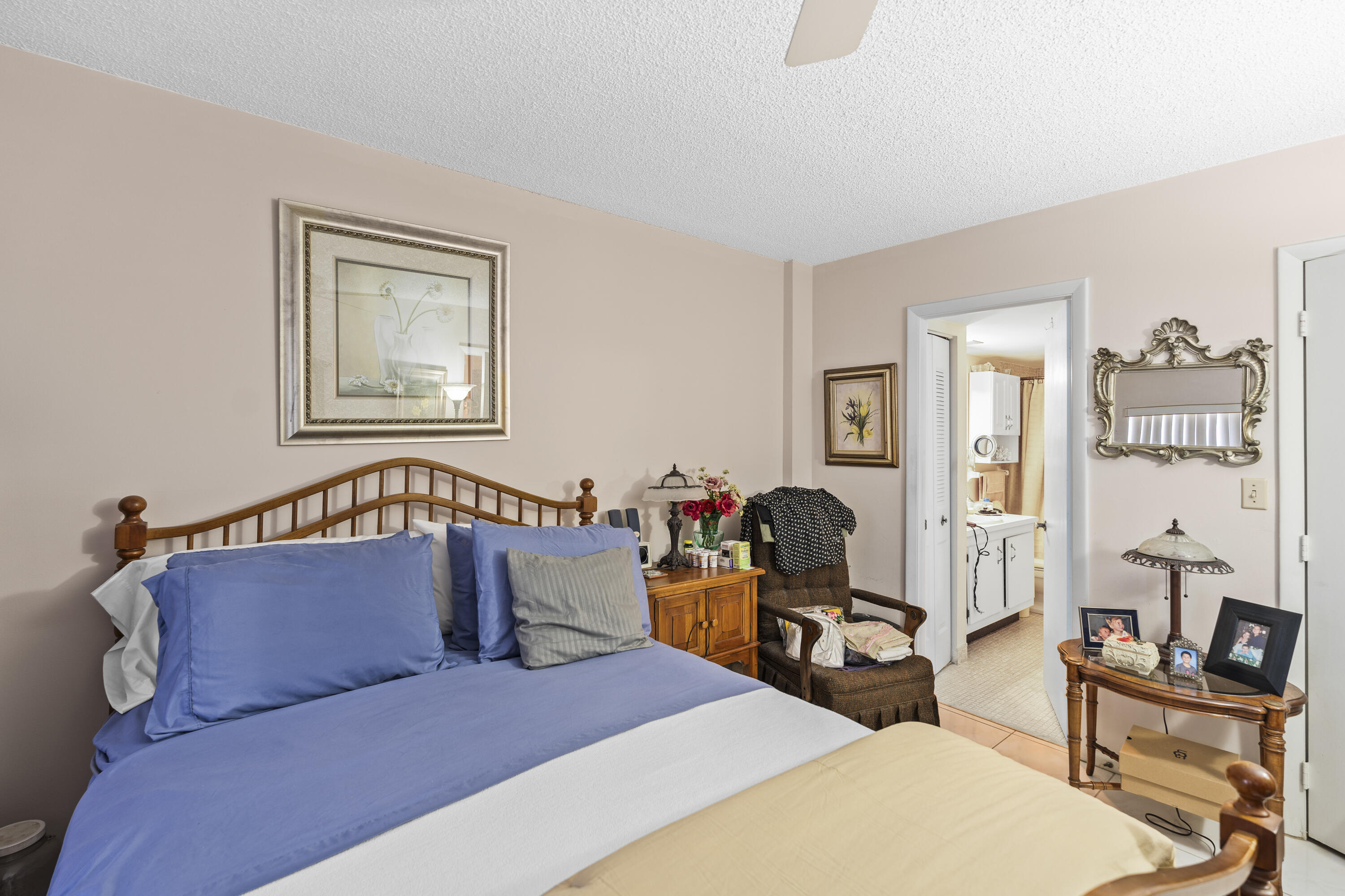 4174 Inverrary Drive, Unit 413 Lauderhill, FL 33319 - Photo 15 of 20 a bedroom with furniture and wooden floor