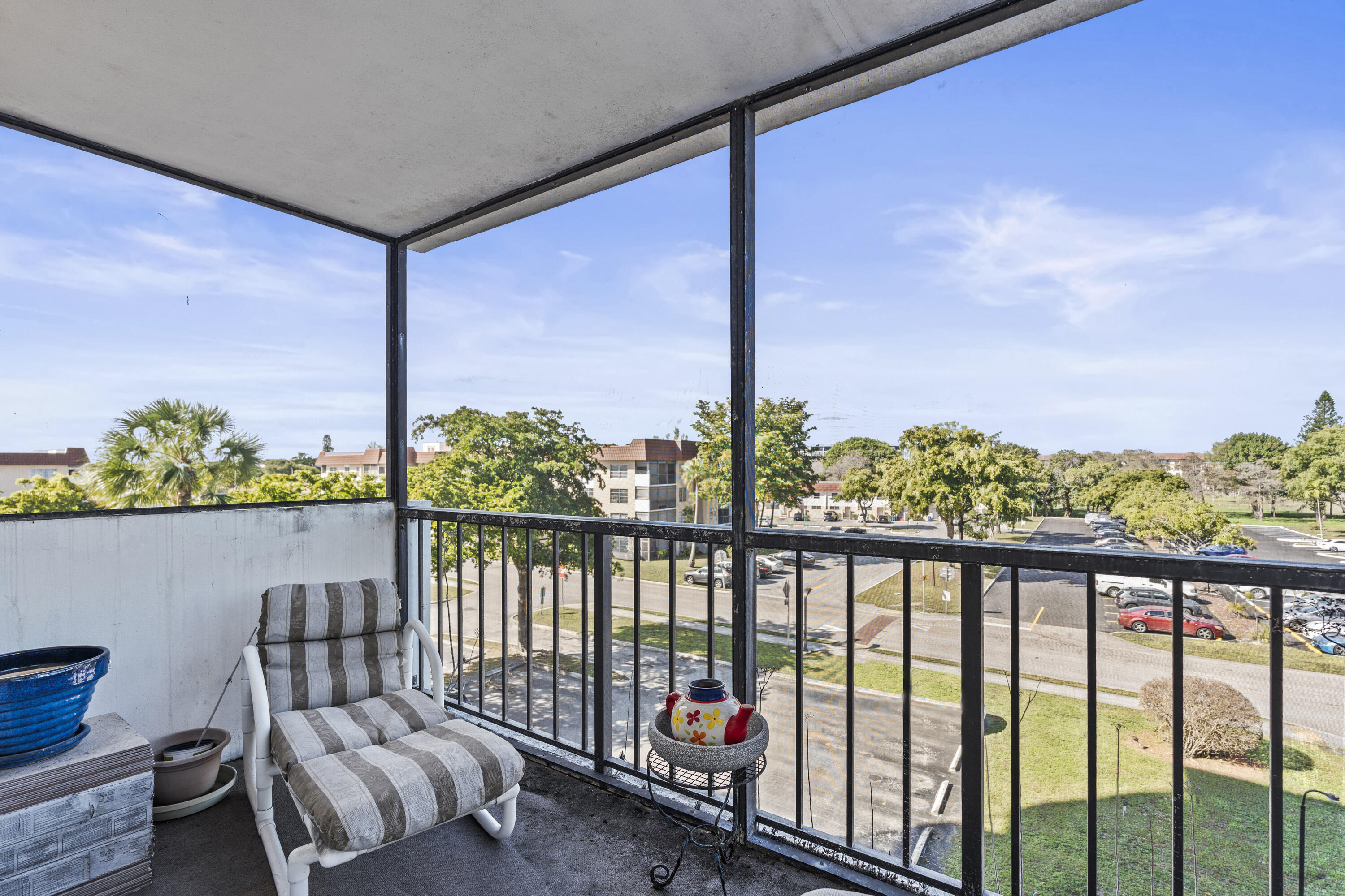 4174 Inverrary Drive, Unit 413 Lauderhill, FL 33319 - Photo 18 of 20 a balcony view with a couch
