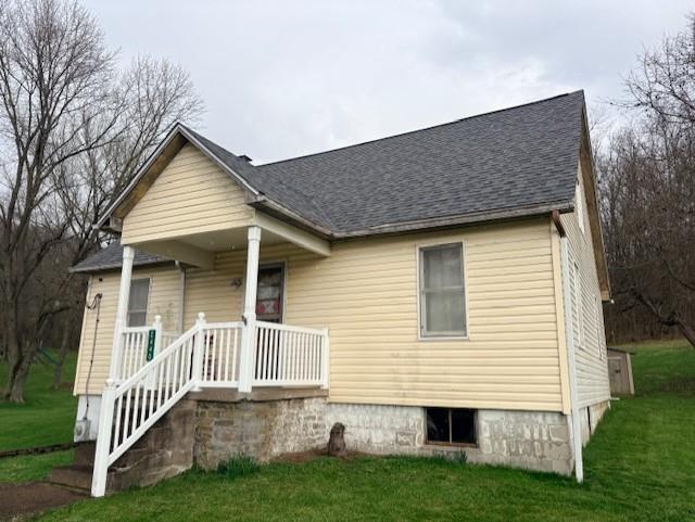 2440 Race Track Road Youngwood, PA 15697 - Photo 2 of 29 a front view of a house with a garden and deck