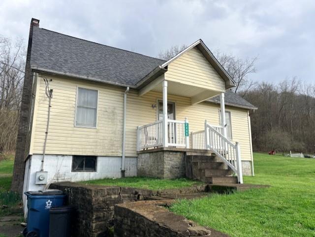 2440 Race Track Road Youngwood, PA 15697 - Photo 4 of 29 a view of backyard of house and trees