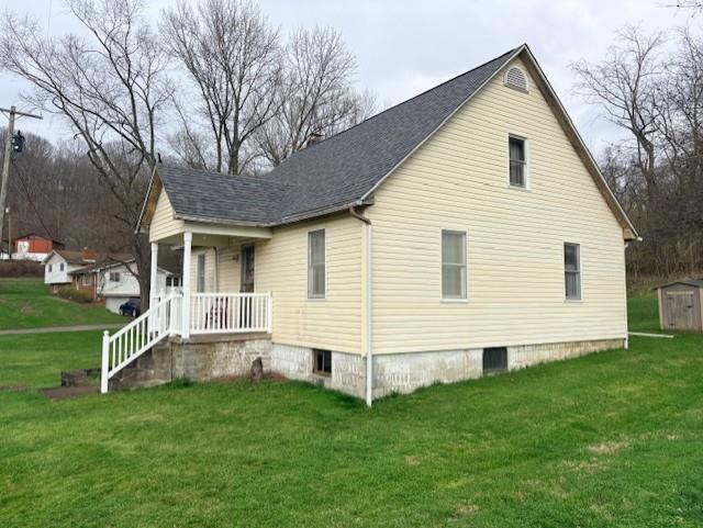 2440 Race Track Road Youngwood, PA 15697 - Photo 6 of 29 a view of a house with a yard