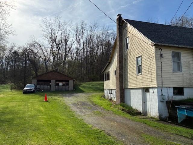 2440 Race Track Road Youngwood, PA 15697 - Photo 7 of 29 a view of a house with backyard and sitting area