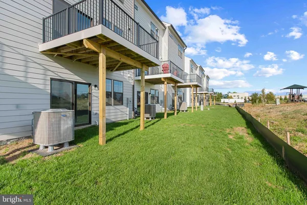 a view of a building with a yard