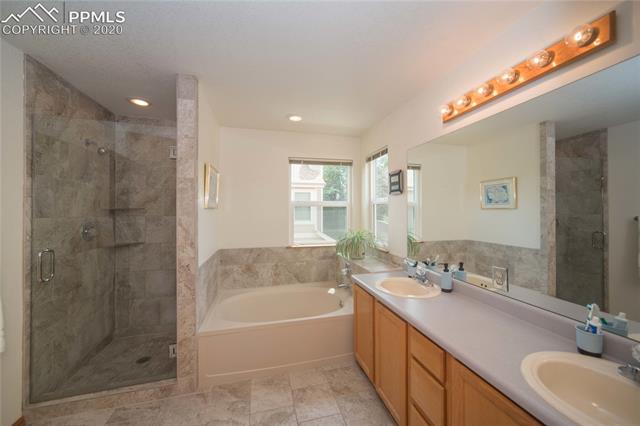 6695 Turkey Tracks Road Colorado Springs, CO 80922 - Photo 16 of 34 Master bath - heated tile floors!