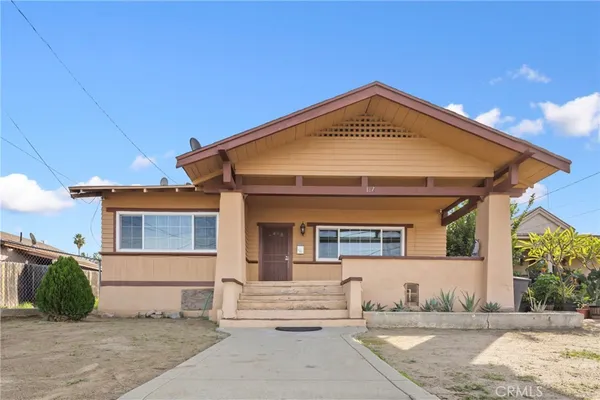 a view of a house with a swimming pool