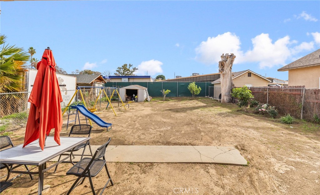 1816 Main Street Riverside, CA 92501 - Photo 21 of 34 a view of a house with a backyard