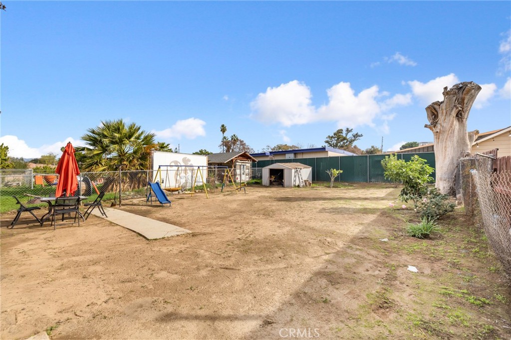 1816 Main Street Riverside, CA 92501 - Photo 22 of 34 a front view of a house with a yard