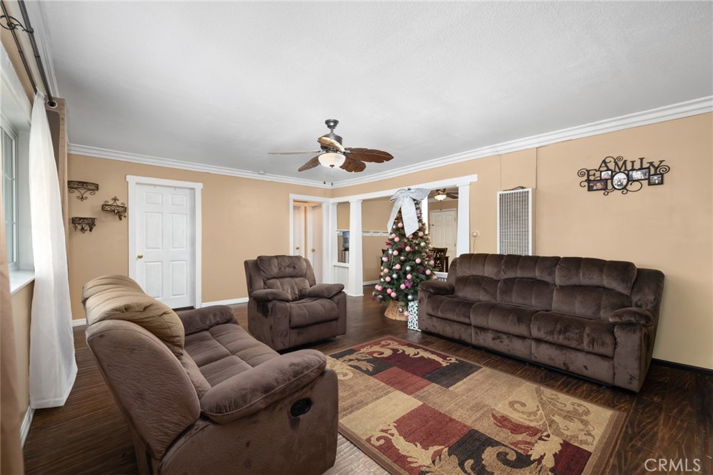 1816 Main Street Riverside, CA 92501 - Photo 6 of 34 a living room with furniture and a chandelier