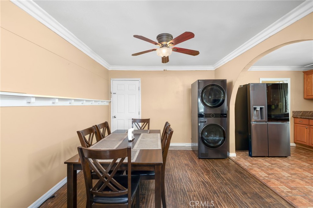 1816 Main Street Riverside, CA 92501 - Photo 9 of 34 a view of a dining room with furniture and wooden floor
