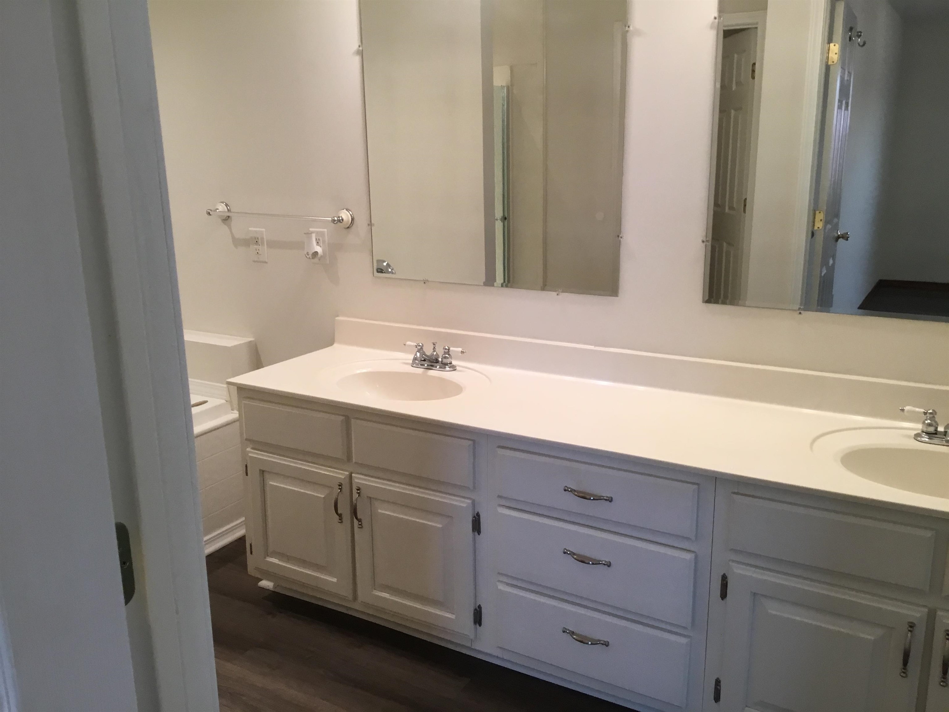 2695 Central Curve Road Ripley, TN 38063 - Photo 18 of 32 a bathroom with a sink and a mirror