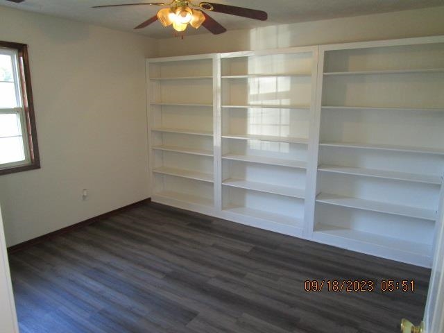 2695 Central Curve Road Ripley, TN 38063 - Photo 25 of 32 a view of an empty room with a window and wooden floor
