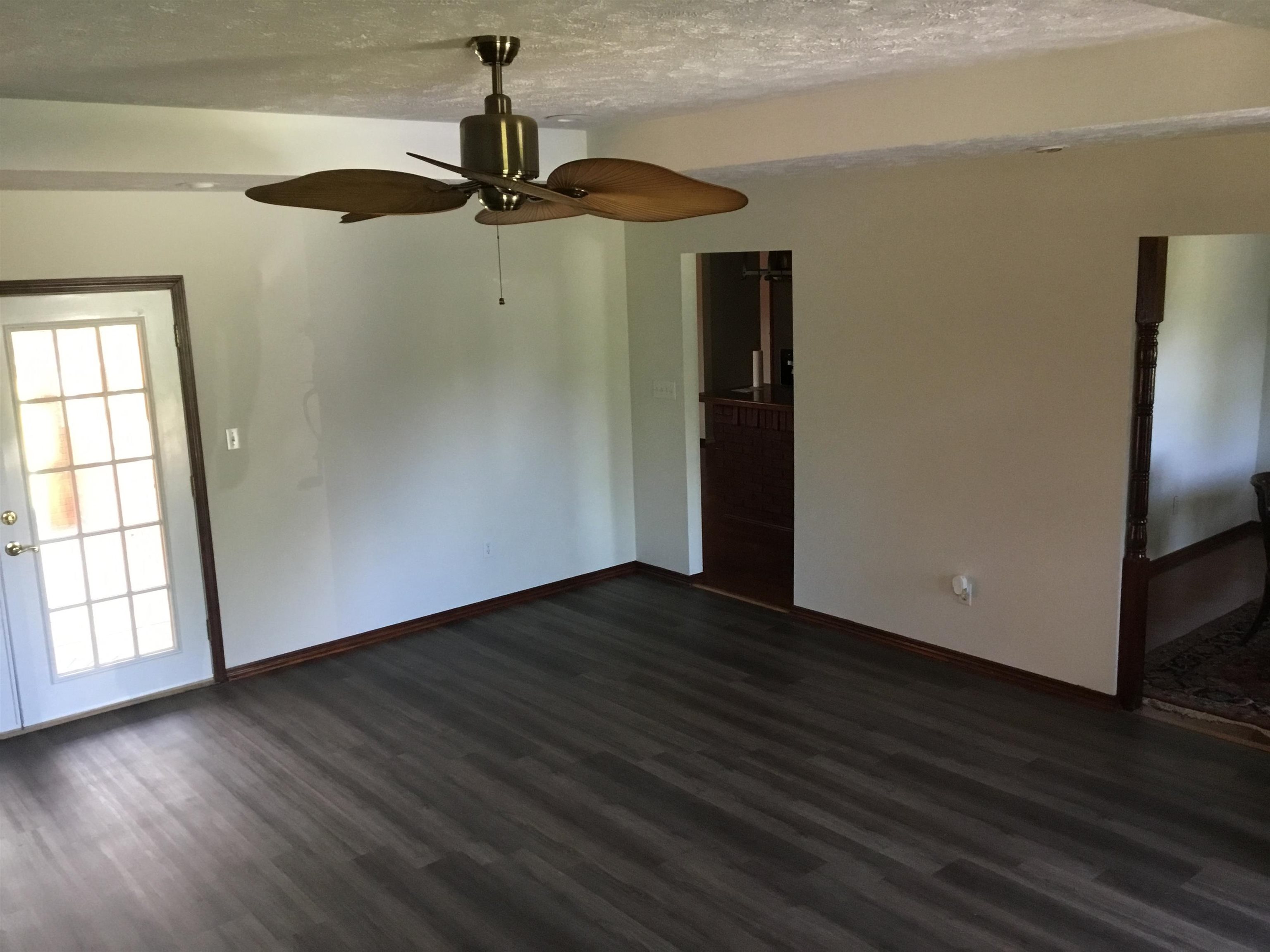 2695 Central Curve Road Ripley, TN 38063 - Photo 8 of 32 a view of empty room with wooden floor